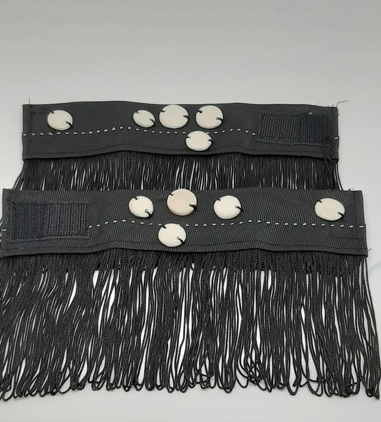 Epoque wrist cuffs in fabric and ceramic